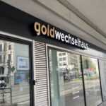 Goudwisselkantoor naam bord gevel